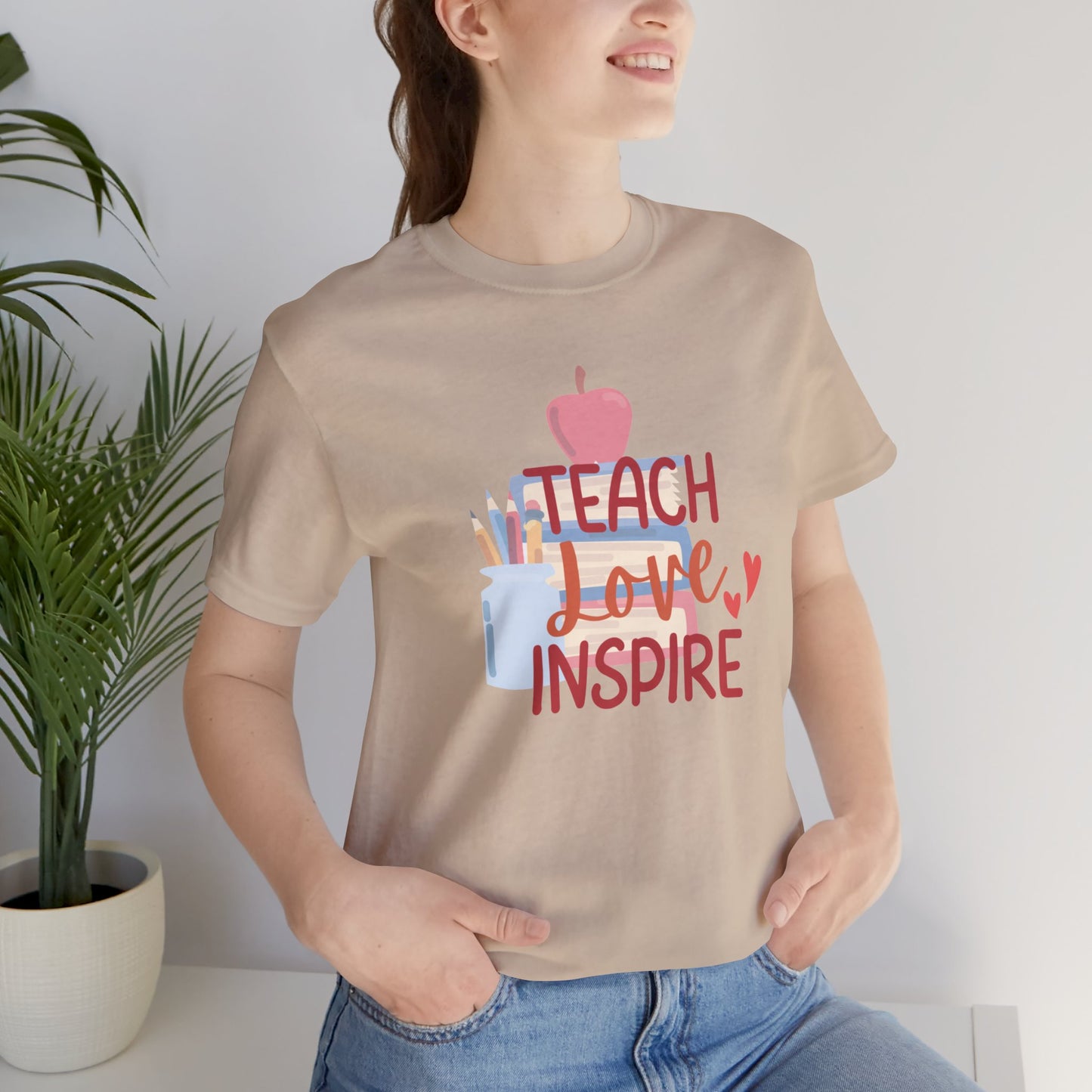 Teach Love Inspire Unisex Jersey Short Sleeve Tee